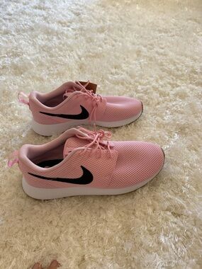 Nike Pink Mesh Runners with Black Swoosh $50
Size 8.5 women 7 men